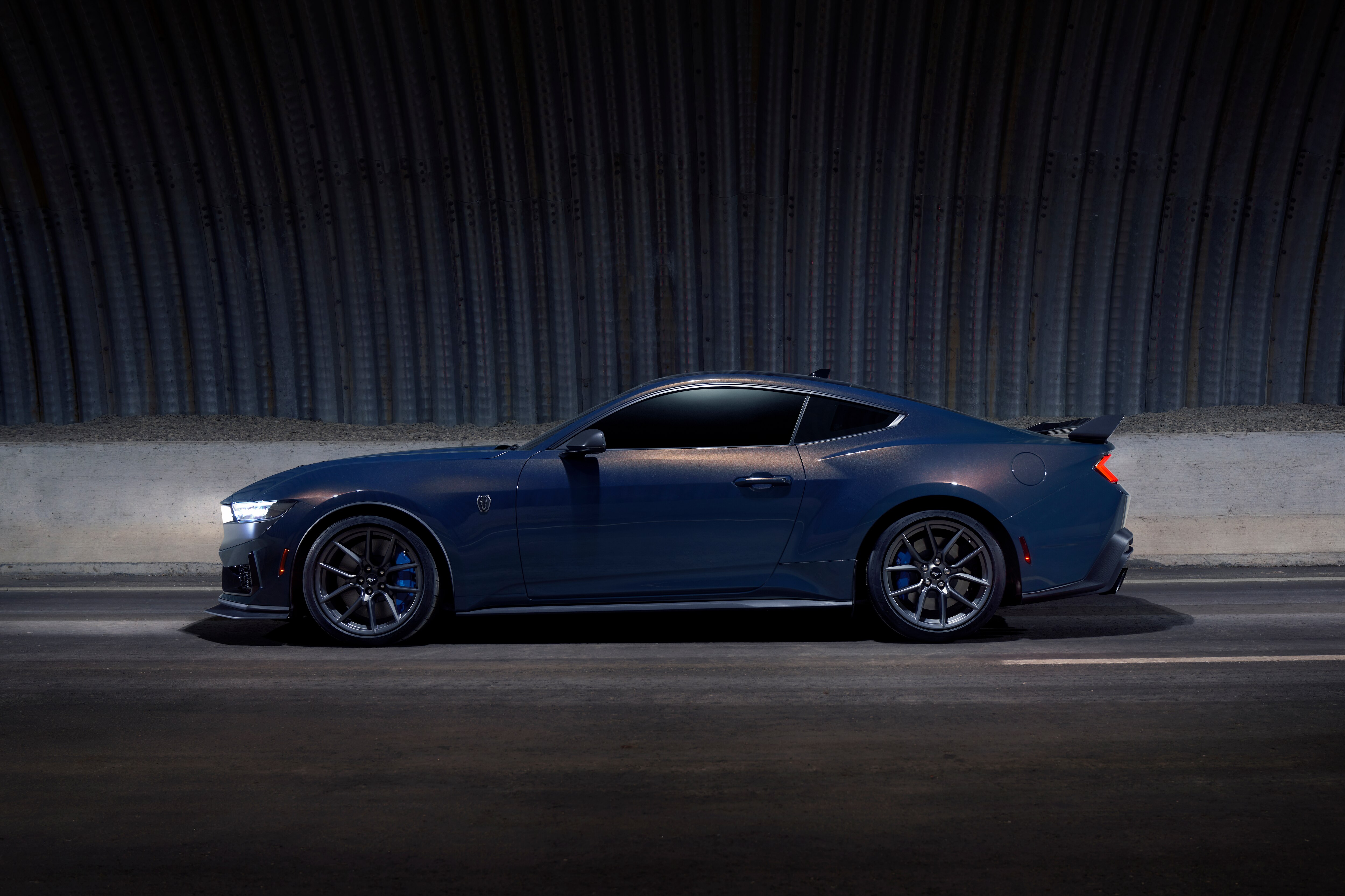 With sinister looks and a specially modified 5.0-liter V8 – the most powerful 5.0-liter V8 ever, projecting 500 horsepower – Dark Horse expands the Mustang lineup and sets a new benchmark for American street and track performance that could only come in a Mustang. Pre-production vehicles shown. 